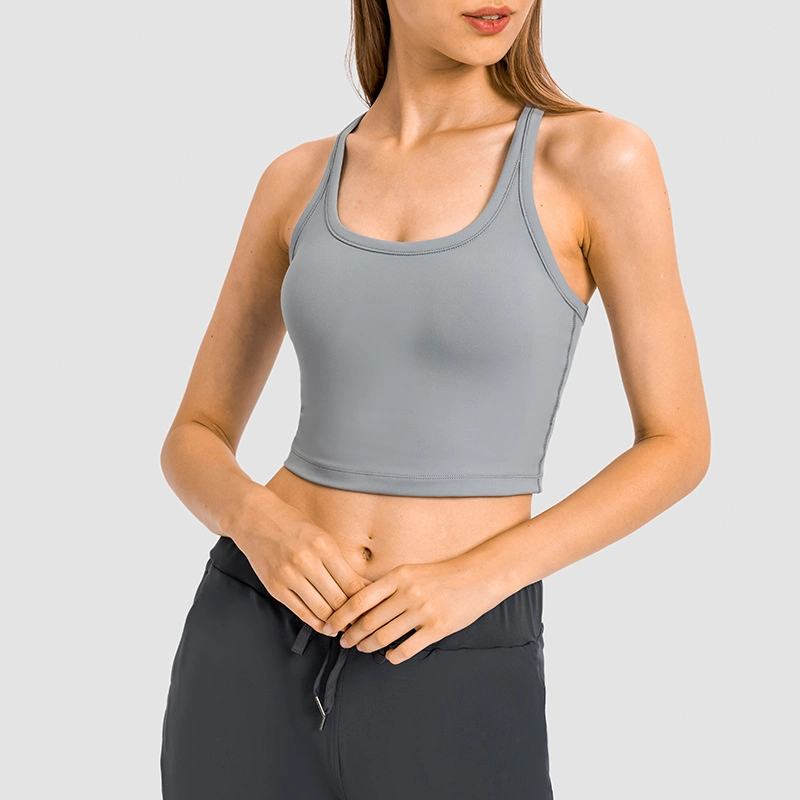 Yoga Vest with Chest Pad Women′s Skin-Friendly Nude Training Fitness Shockproof Sports Bra Jkt-320